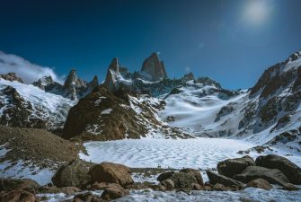 pexels-photo-3158519-3158519 Majestic snow-covered mountains and rugged terrain in El Chaltén, Argentina under a clear winter sky.